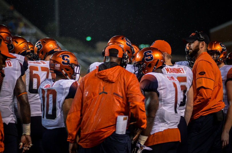 Syracuse gathers during a stoppage in play.