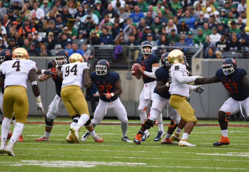 Eric Dungey sits in the pocket waiting for a receiver to break open. He was 31-for-51 for 363 yards and two touchdowns.