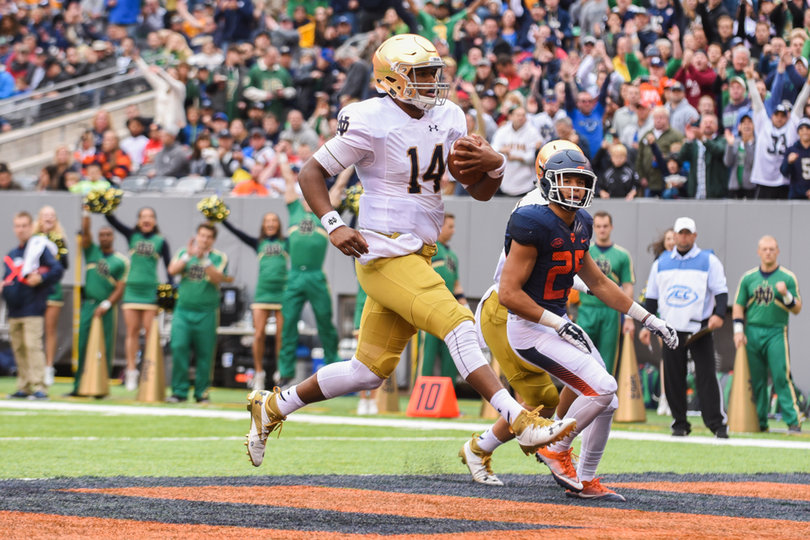 Kizer jogs into the end zone for a touchdown. He ran the ball for only a net of one yard.