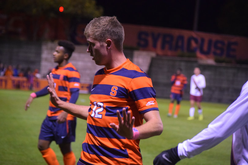 John-Austin Ricks holds his hands up during a brief stoppage of play. He subbed into the game but did not record a stat.