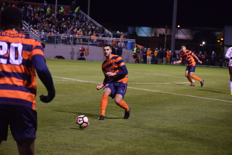 Louis Cross passes the ball to Kamal Miller. The defenders held VT to six shots.