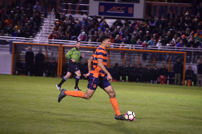 SU defender Miles Robinson dribbles the ball up the field. He missed the team's last two games to be with the U.S. Under-20 Men's National Team.
