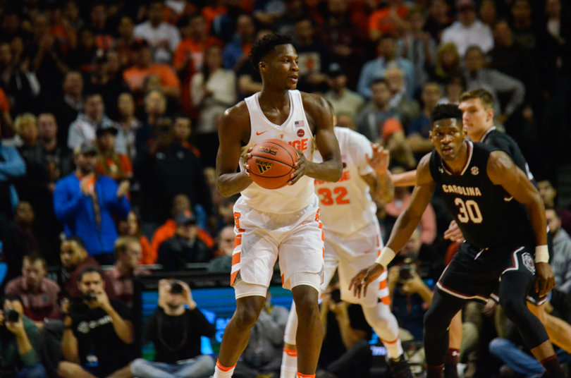 Tyler Roberson holds the ball near the top of the key on offense. Roberson didn't make a shot from the floor and had only one point.