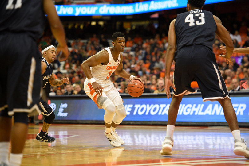 White dribbles into the lane. He's averaging 18 points per game through Syracuse's first three contests. 