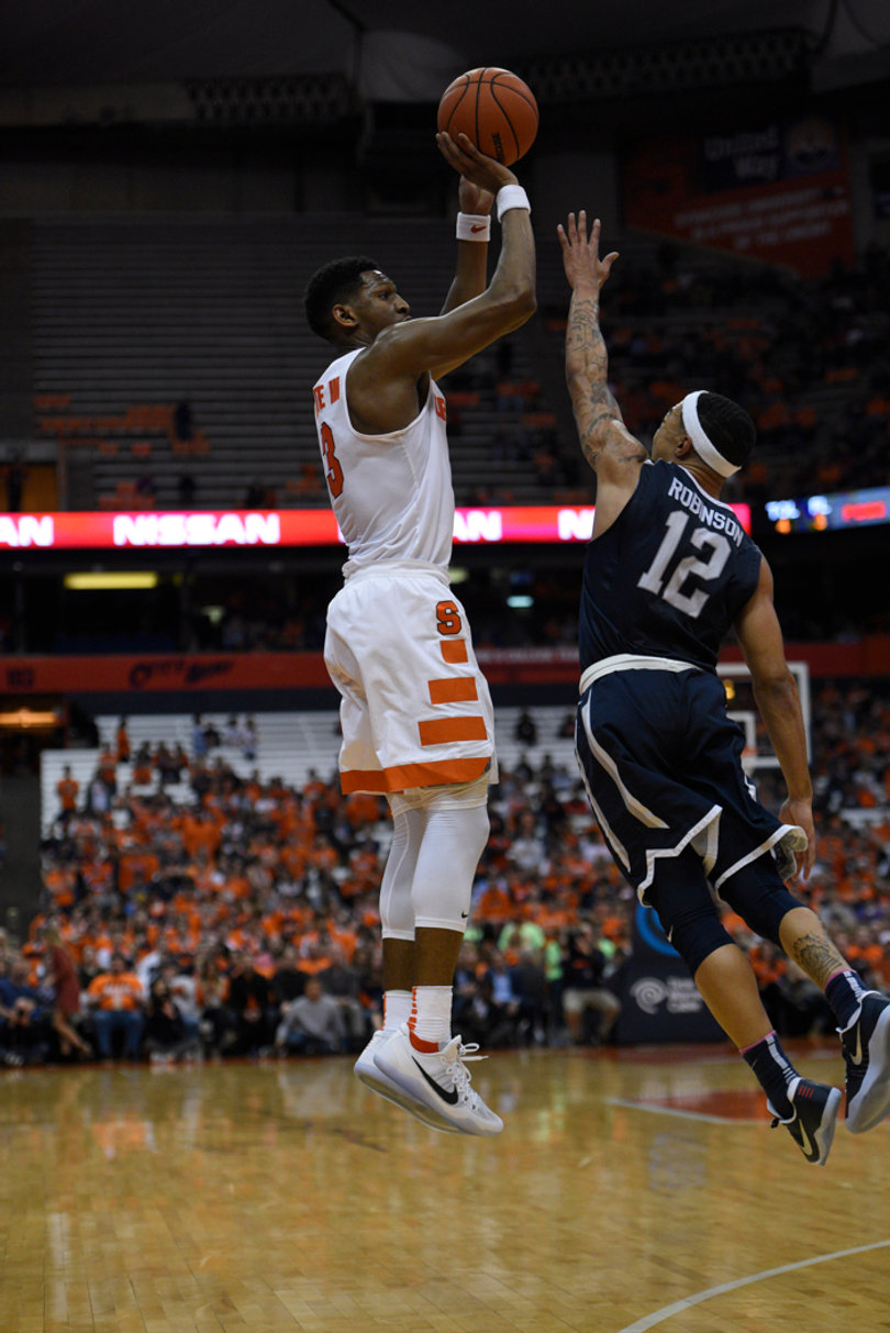 White elevates for a jump shot over Robinson. He was 3-of-9 from 3-point range.