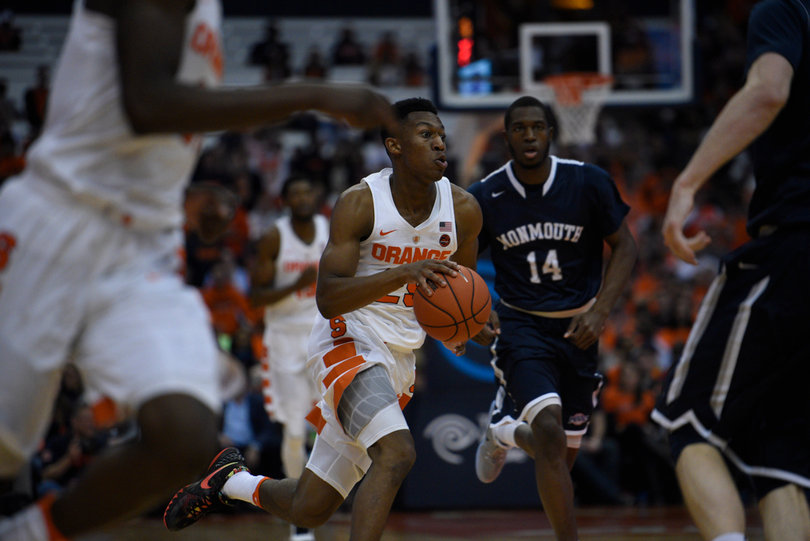 Tyus Battle runs an Orange fastbreak down the court. Battle was 3-for-4 from deep and had nine points.