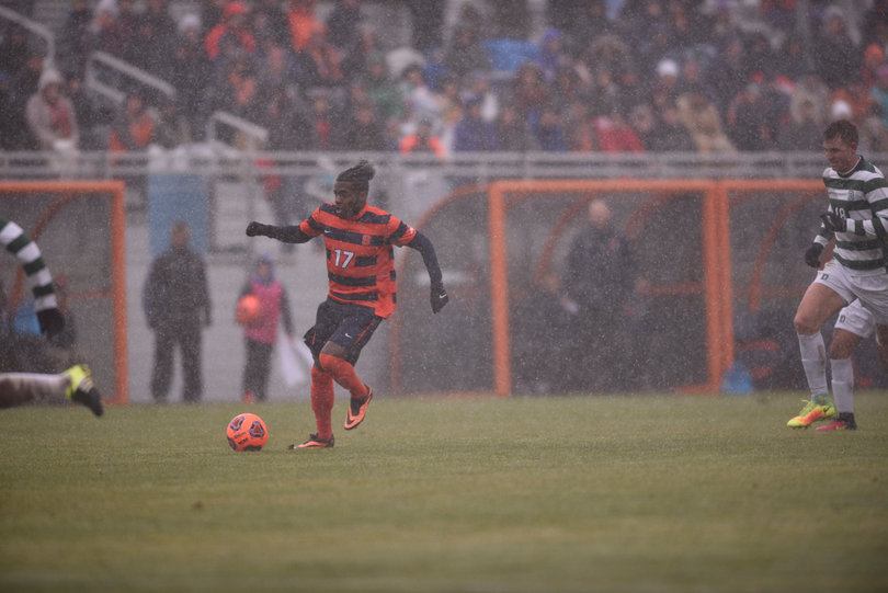 Nanco possesses the ball in open space. Nanco scored SU's first goal of the game off a rebound in front of the net.