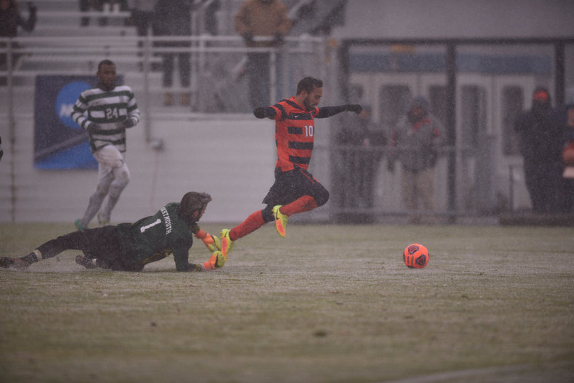 Sergio Camargo dribbles by Dartmouth goalie James Hickok right before notching his second goal of the game.