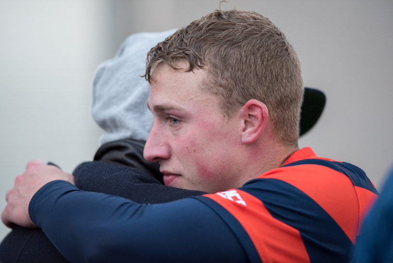 Callahan hugs someone after the game.