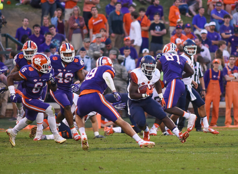 Sophomore running back Jordan Fredericks runs the ball against the Tigers stifling defense. 
