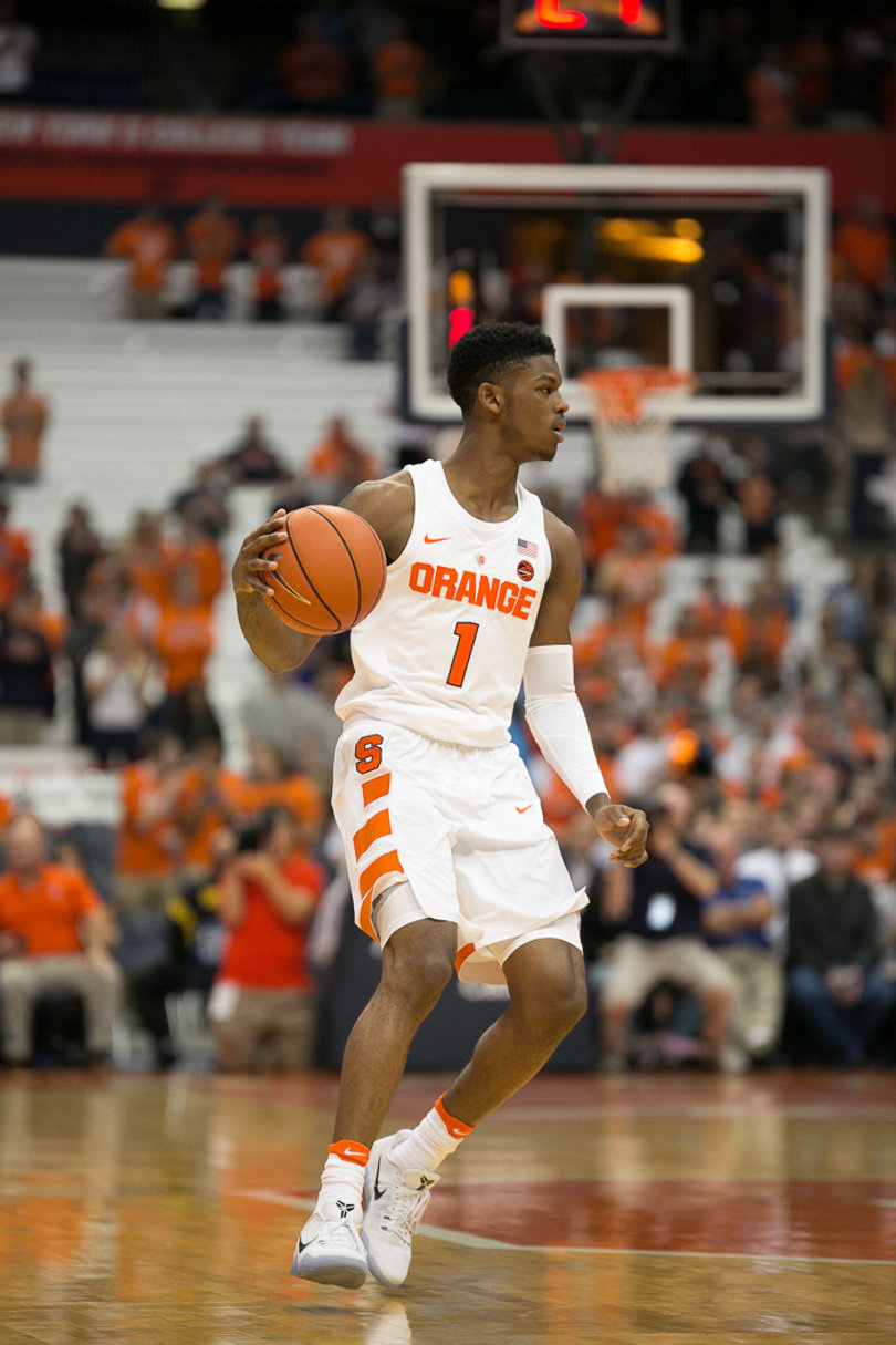 Sophomore point guard Frank Howard surveys his options. He finished with 10 points. 