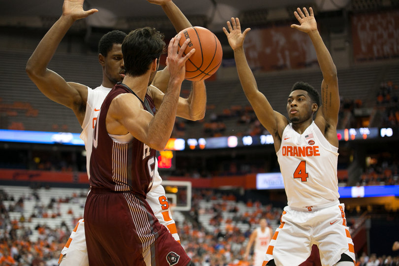 The Orange experimented with man-to-man defense before switching back to its 2-3 zone. 
