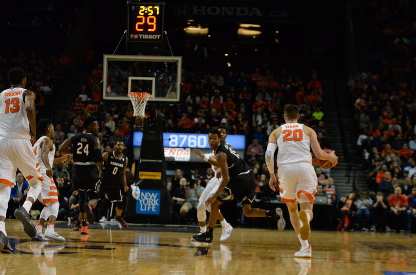 Lydon dribbles the ball down the court. No other SU player scored more than 10 points.