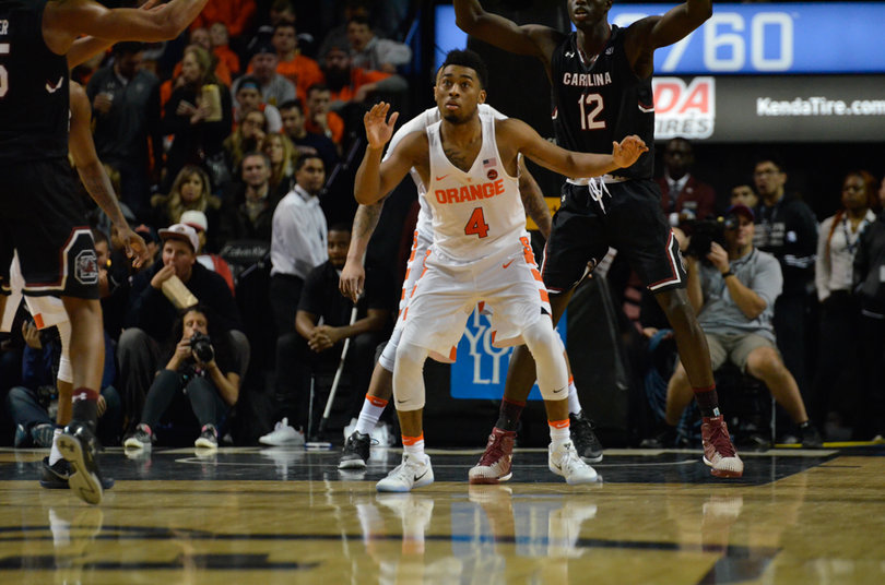 Gillon applies pressure at the top of the Orange 2-3 zone.