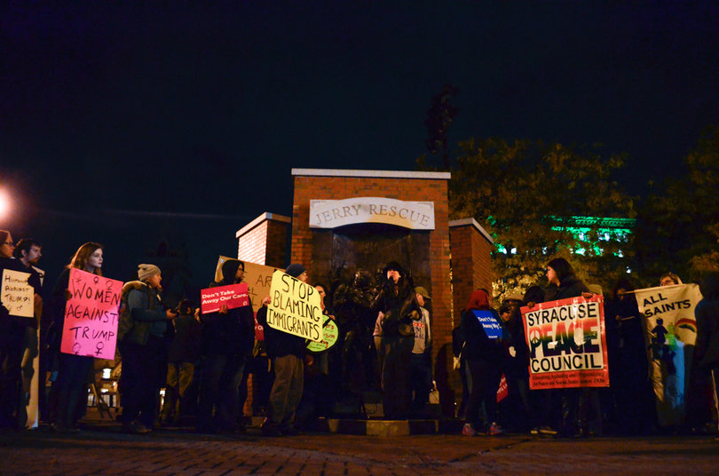 Syracuse residents protest Donald Trump in Clinton Square. 