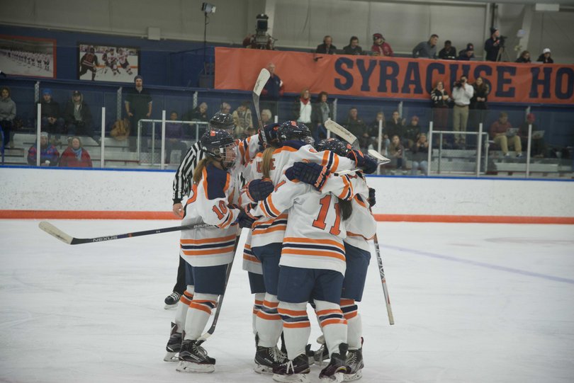 Syracuse celebrates during the game. SU scored two first-period goals.