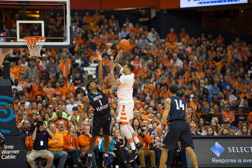 Coleman puts up a contested shot in the paint.