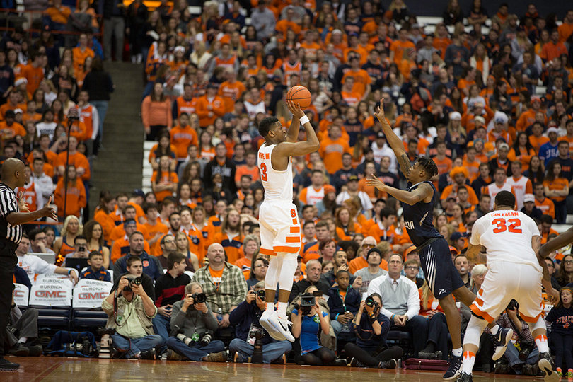 White hoists a shot from just inside the 3-point line.