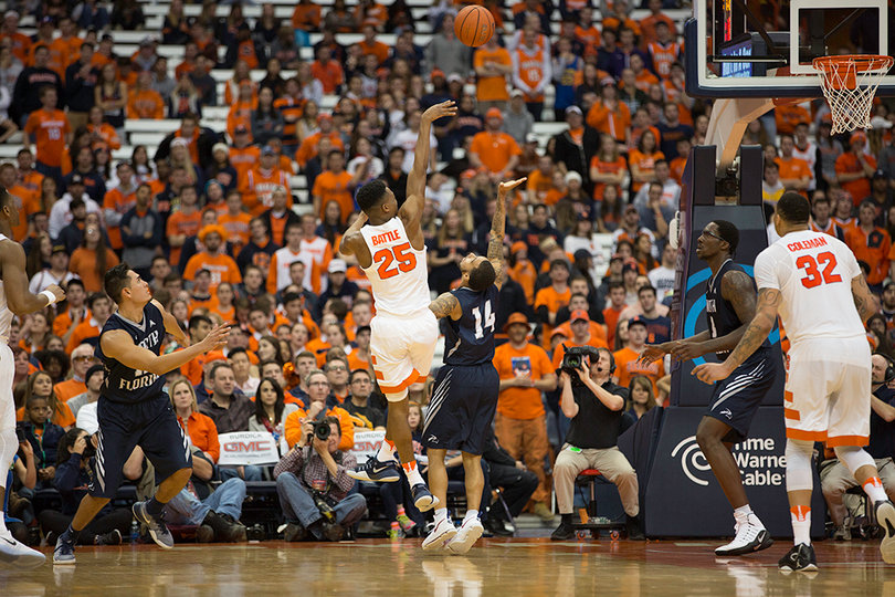 Battle floats a shot toward the net. He went 6-for-7 including 4-of-5 from 3-point land.