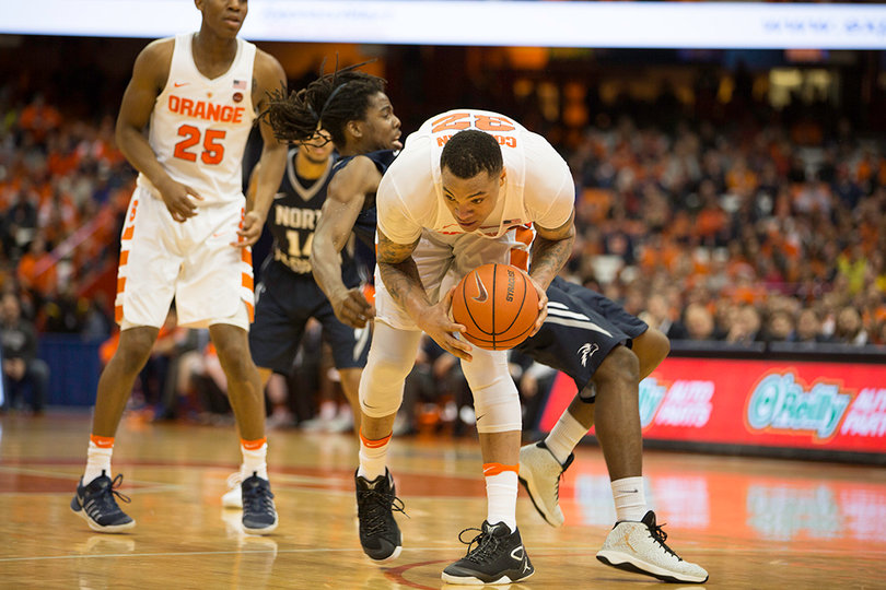 Dajuan Coleman gets physical with an Ospreys defender.