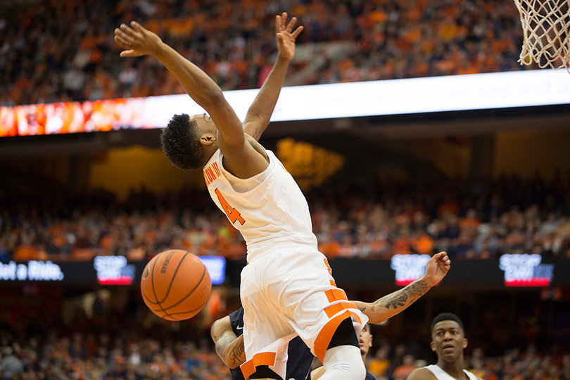 John Gillon flails backward as the ball carries away from him. He had two turnovers and no points.