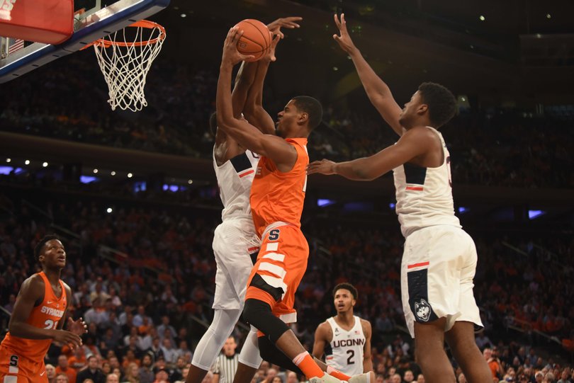 Andrew White tries to get a shot off in traffic. White led SU with 14 points but was just 4-for-15.