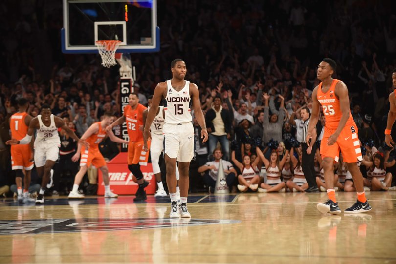 Purvis walks back to the defensive end as Battle appears upset. 