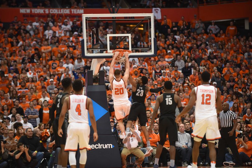 Twenty-nine points from Tyler Lydon — a career-high for the sophomore forward — didn't cut it as SU fell to Georgetown, 78-71. Here, Lydon hangs on the rim after his and-1 jam. 