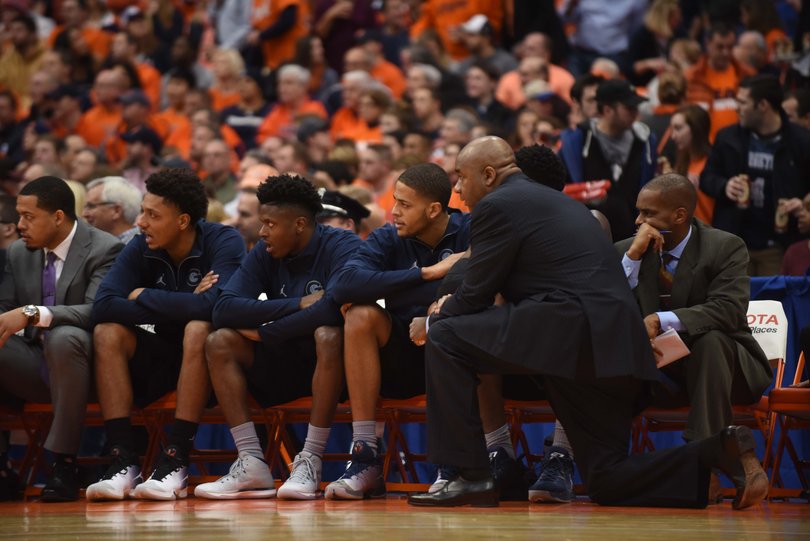 Georgetown head coach John Thompson III looks on.