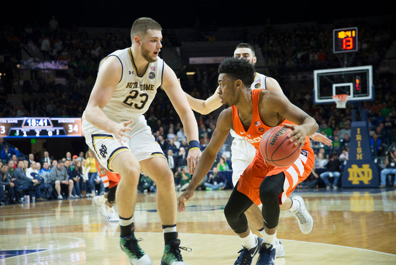 Gillon faces a double team. A few weeks ago it looked like he had control of the starting point guard role, but today he played fewer minutes than Howard