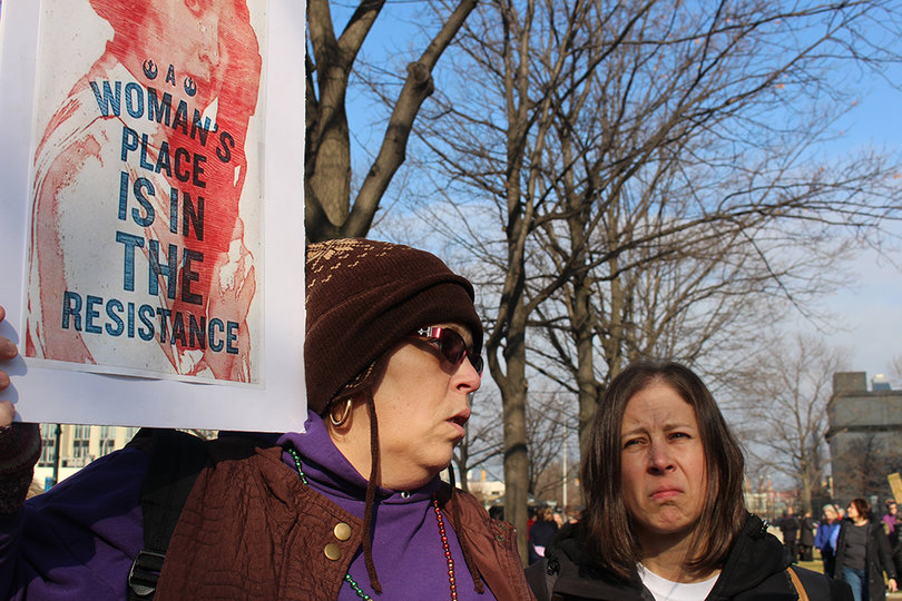 Annette Labarge holds a sign that reads "a woman's place is in the resistance." The Women's March movement was organized primarily by women.