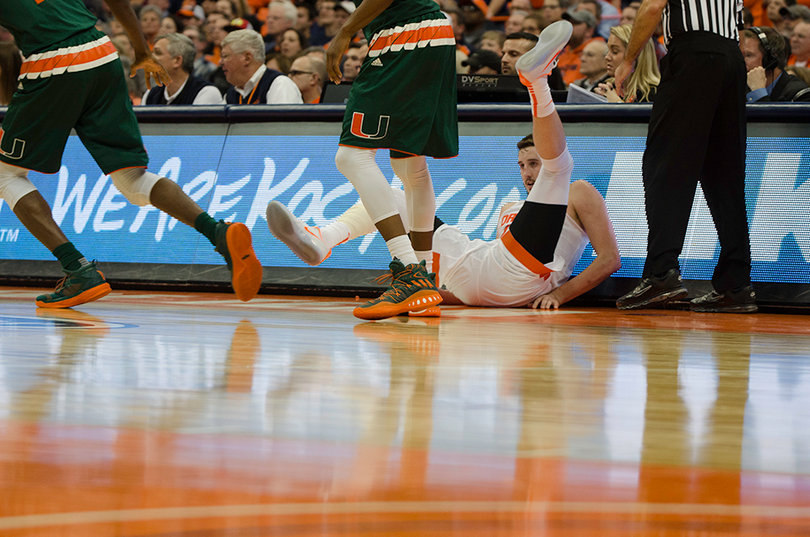 Lydon has some fun dodging a ball as he sits in front of the scorer's table. 