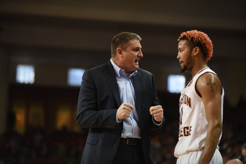 BC head coach Jim Christian speaks with Ky Bowman, who scored a game-high 30 points. 