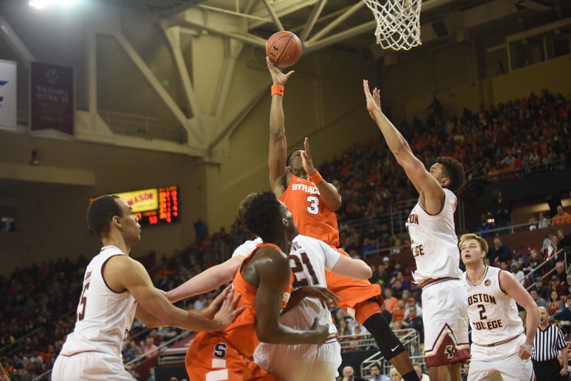 White floats one toward the hoop. 