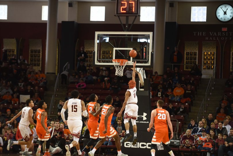 After gliding through the defense, Bowman lays the ball off the glass. 