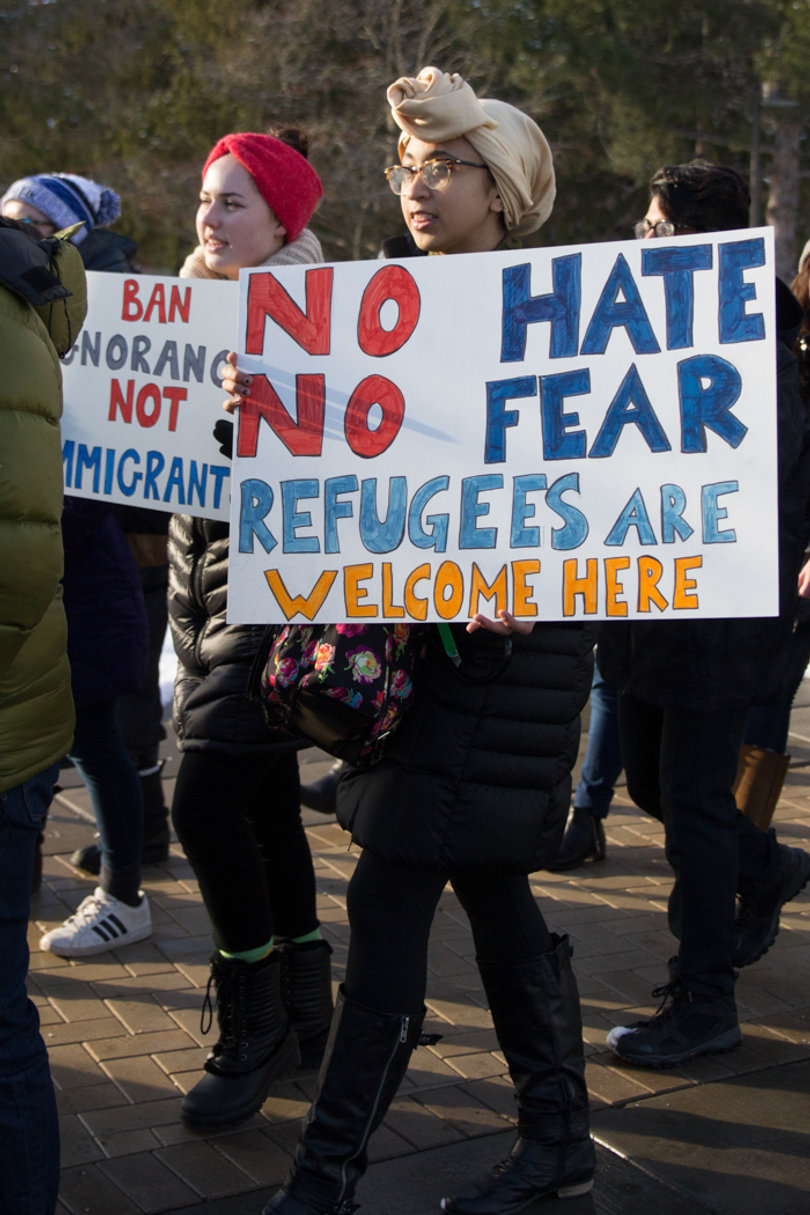 As the march began, cries of "No hate, no fear, refugees are welcome here" started, coinciding with signs of the protesters.