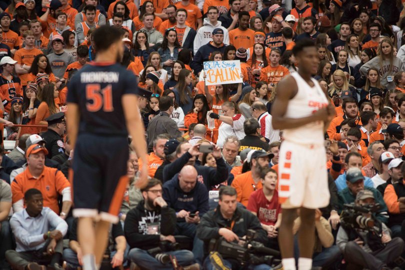 The reported attendance was 27,553, the largest on-campus crowd at a college basketball game this season.
