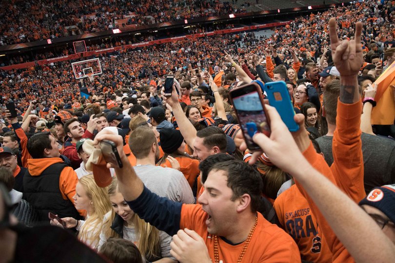 Fans stormed the court after the win for the second straight week. 