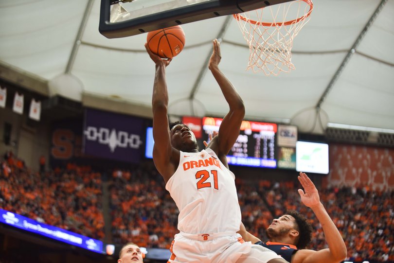 Tyler Roberson goes up for a layup against Virginia.