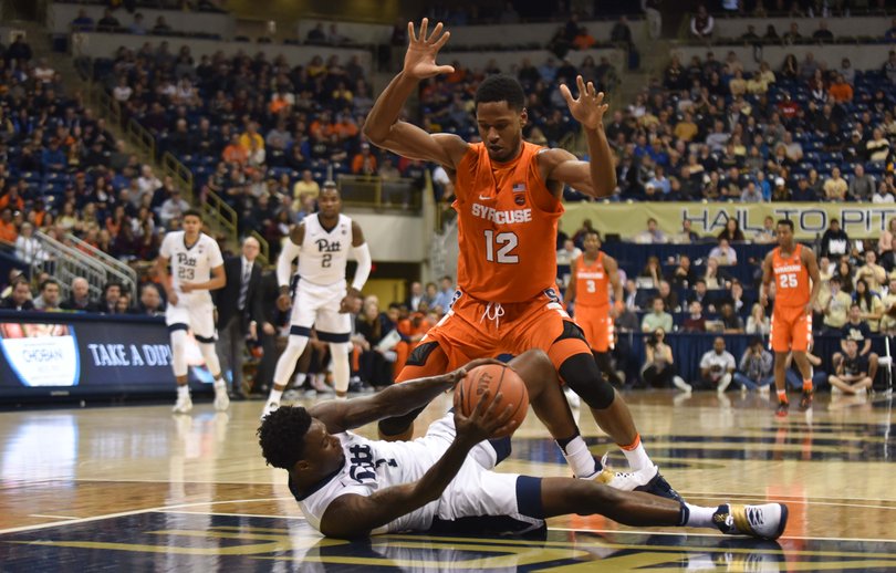 Thompson puts his hands up to close off passing lanes after a Pitt player falls to the floor. 