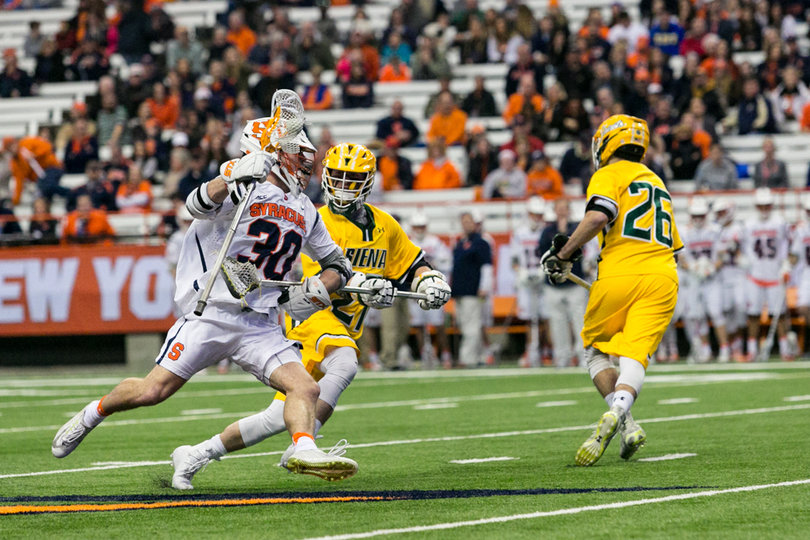 Riley O'Sullivan works on a defender. 