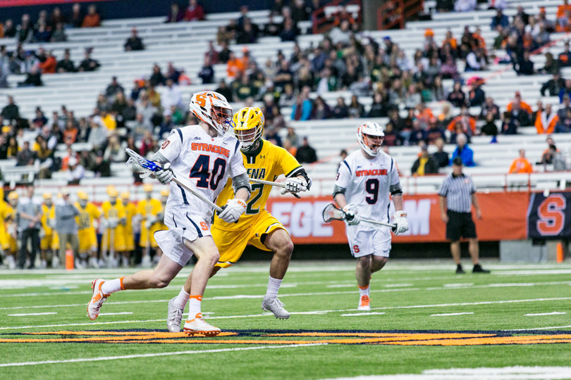 Peter Dearth (40) gets out in a sprint. 