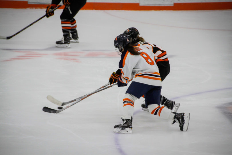 Grossi looks to get the puck and get to the net. 