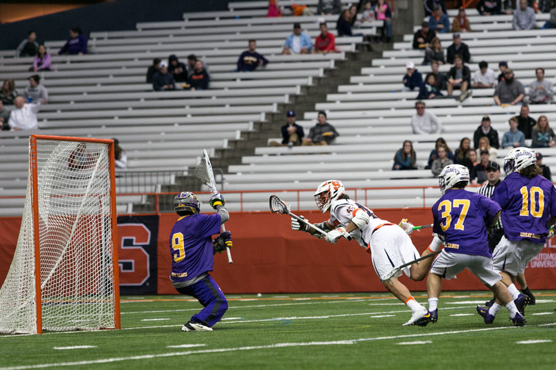 Brendan Bomberry dives toward net. 