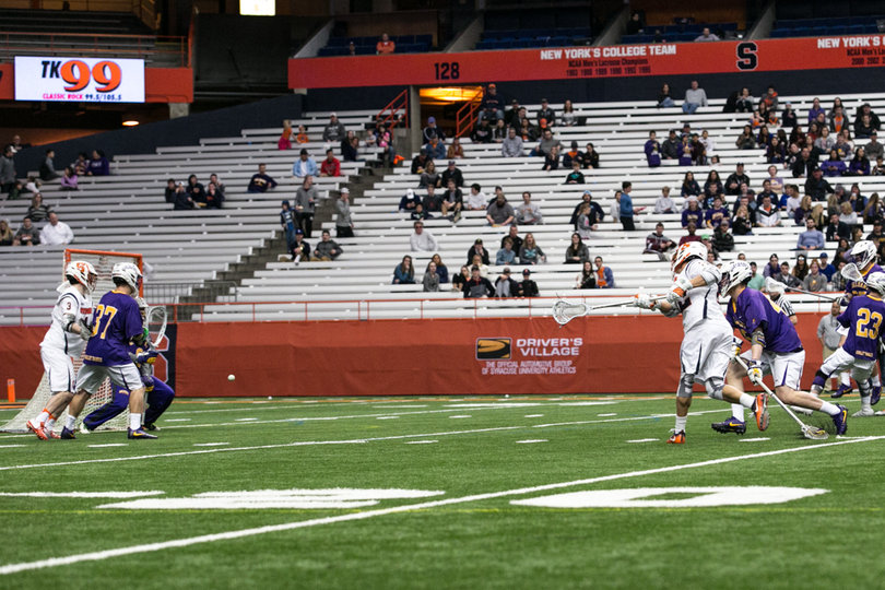 Jordan Evans shoots the ball toward goal. 