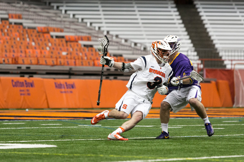 Solomon tries to spin past an Albany player. 