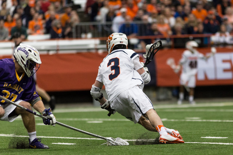Solomon breaks past an Albany defender. 