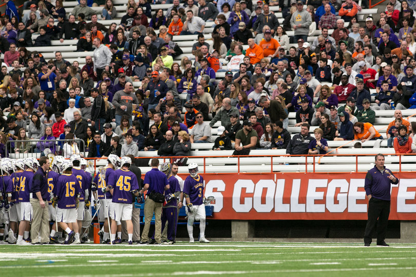 Albany's huddles on the sideline. 