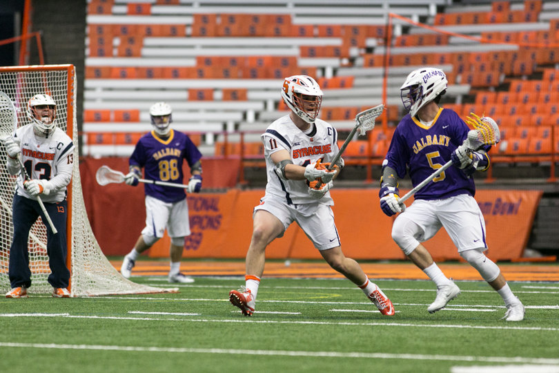Firman guards Albany star Connor Fields. 