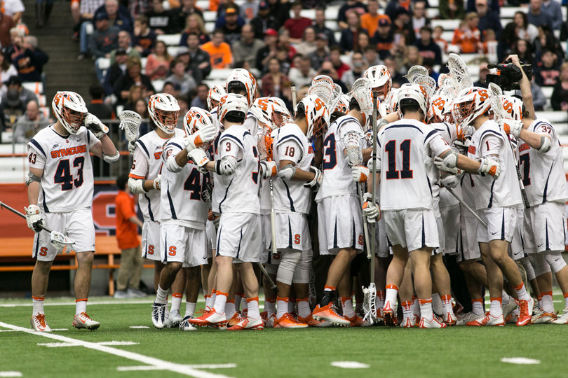 Syracuse huddles up before the game. 